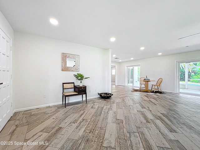 201 Woody Cir, Melbourne Beach, FL 32951 - entrance foyer with light wood-style floors, baseboards, and recessed lighting