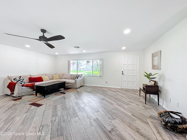 201 Woody Cir, Melbourne Beach, FL 32951 - living area with light wood-style flooring, ceiling fan, baseboards, and recessed lighting