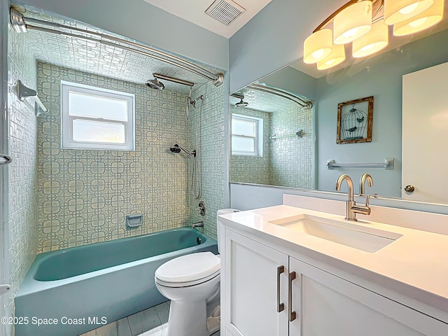 201 Woody Cir, Melbourne Beach, FL 32951 - full bath featuring washtub / shower combination, vanity, and toilet