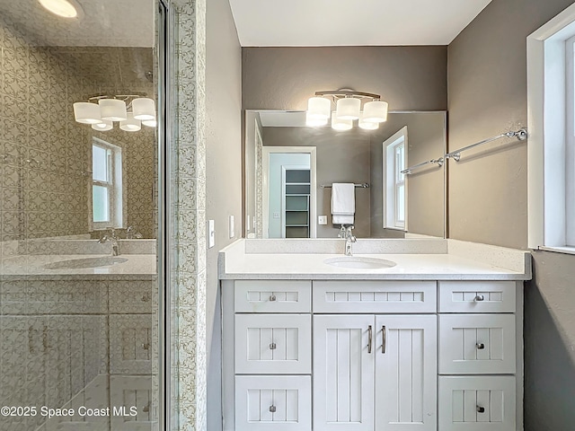 201 Woody Cir, Melbourne Beach, FL 32951 - bathroom featuring vanity and a shower stall