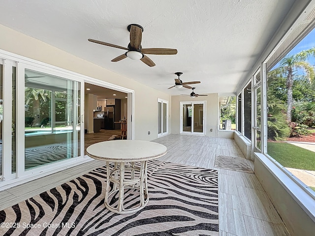201 Woody Cir, Melbourne Beach, FL 32951 - sunroom featuring ceiling fan
