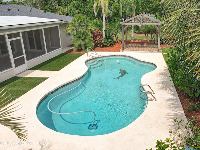 201 Woody Cir, Melbourne Beach, FL 32951 - swimming pool with a gazebo, a sunroom, and a patio area