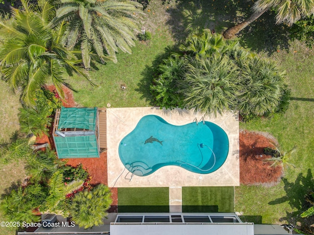 201 Woody Cir, Melbourne Beach, FL 32951 - bird's eye view of a pool area