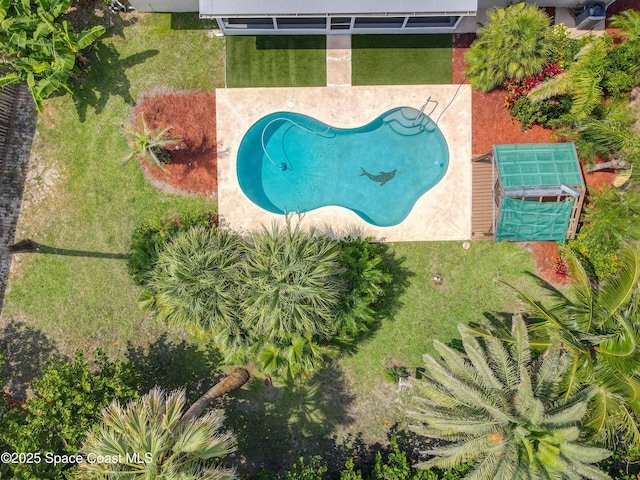 201 Woody Cir, Melbourne Beach, FL 32951 - bird's eye view of a pool