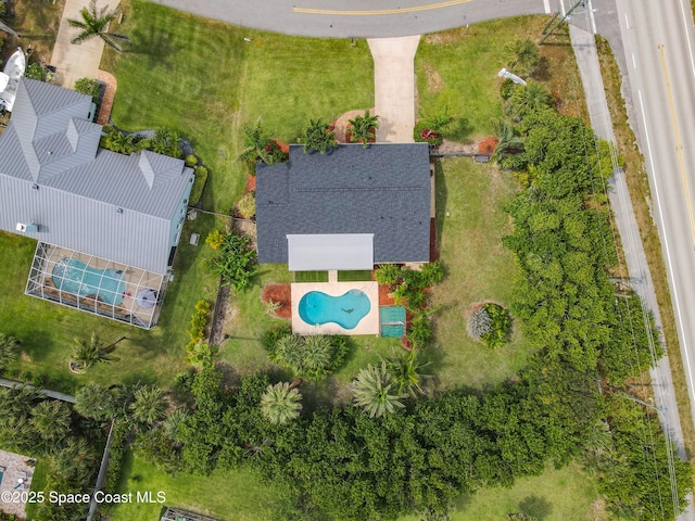 201 Woody Cir, Melbourne Beach, FL 32951 - drone / aerial view of a pool