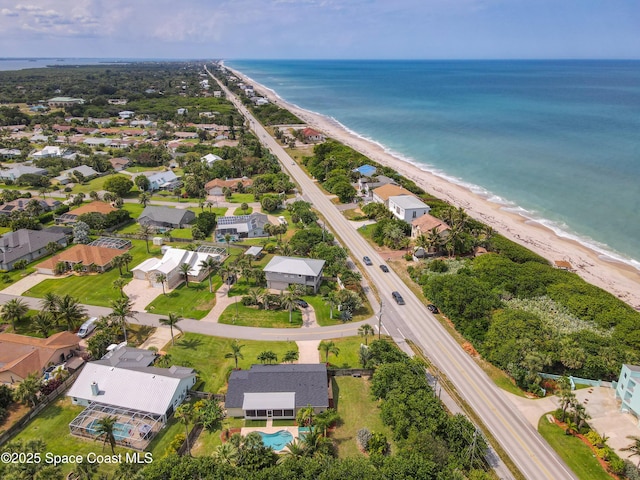 201 Woody Cir, Melbourne Beach, FL 32951 - aerial view of property and surrounding area with expansive coastline and nearby suburban area