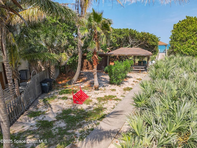 201 Woody Cir, Melbourne Beach, FL 32951 - view of yard featuring a gazebo and cooling unit