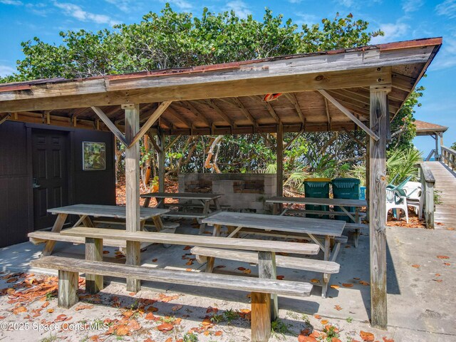 201 Woody Cir, Melbourne Beach, FL 32951 - wooden terrace featuring a gazebo