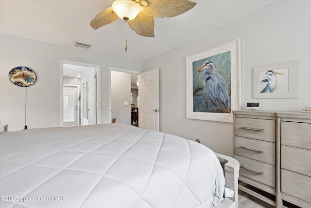 4625 Curtis Blvd, Cocoa, FL 32927 - bedroom with a ceiling fan and wood finished floors