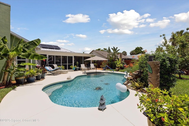 4625 Curtis Blvd, Cocoa, FL 32927 - outdoor pool featuring a sunroom, a patio, and a fenced backyard