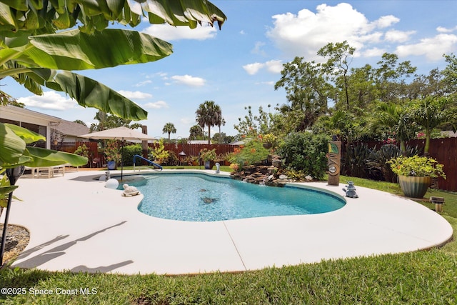 4625 Curtis Blvd, Cocoa, FL 32927 - view of swimming pool with a fenced backyard and a patio