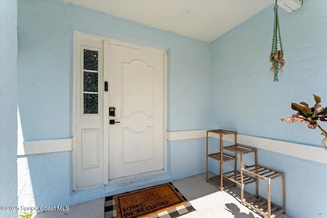 2350 Fallon Blvd NE, Palm Bay, FL 32907 - doorway to property with stucco siding