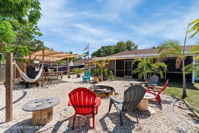 2350 Fallon Blvd NE, Palm Bay, FL 32907 - view of patio / terrace featuring an outdoor fire pit