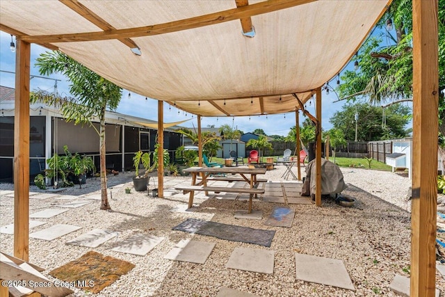 2350 Fallon Blvd NE, Palm Bay, FL 32907 - fenced backyard with a patio area