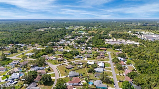 2350 Fallon Blvd NE, Palm Bay, FL 32907 - aerial view of property and surrounding area featuring a heavily wooded area