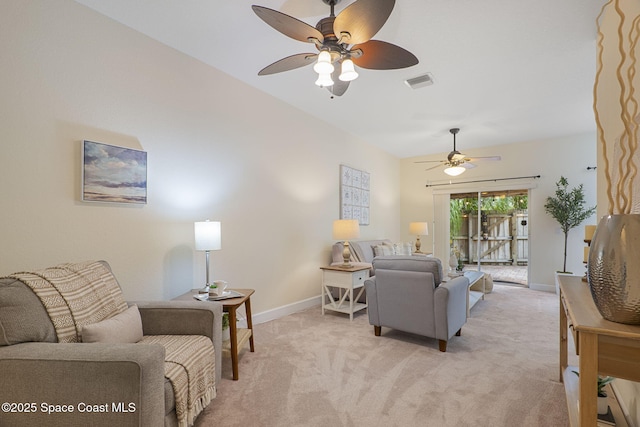7961 Evelyn Ct, Cape Canaveral, FL 32920 - living room with a ceiling fan, light carpet, and baseboards
