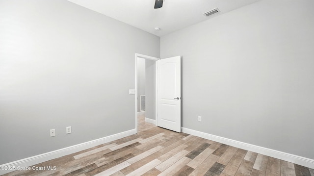 5852 Goleta Cir, Melbourne, FL 32940 - unfurnished room with ceiling fan, baseboards, and light wood finished floors
