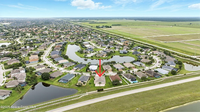 5852 Goleta Cir, Melbourne, FL 32940 - aerial view of property and surrounding area featuring nearby suburban area and a large body of water