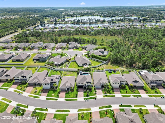 4647 Broomsedge Cir, West Melbourne, FL 32904 - aerial overview of property's location featuring a large body of water and nearby suburban area