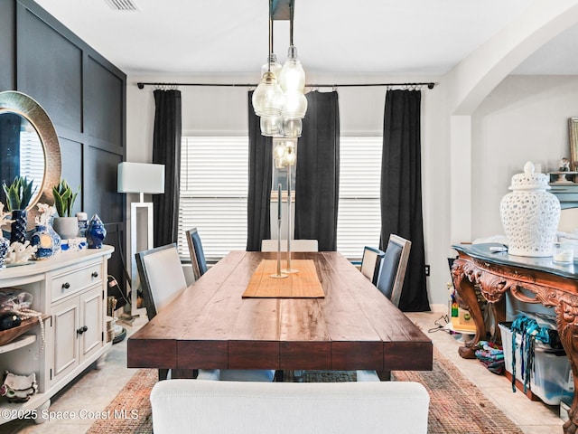 4647 Broomsedge Cir, West Melbourne, FL 32904 - dining area with arched walkways