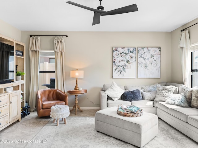 4647 Broomsedge Cir, West Melbourne, FL 32904 - tiled living room featuring a ceiling fan and baseboards