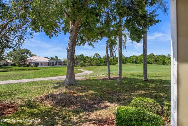 8051 Daventry Dr, Melbourne, FL 32940 - view of grassy yard with view of golf course