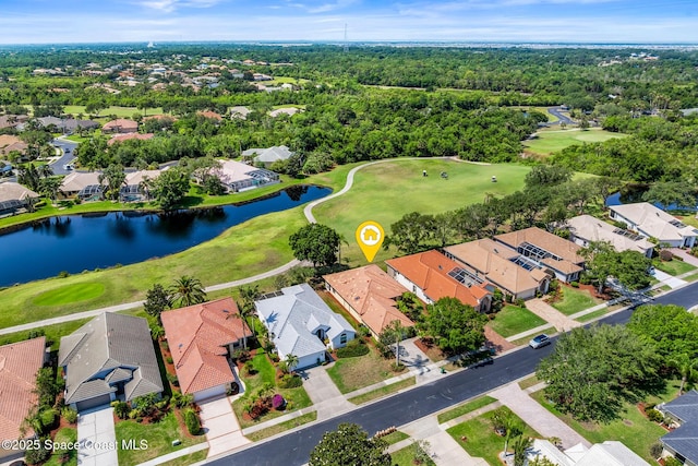 8051 Daventry Dr, Melbourne, FL 32940 - aerial perspective of suburban area with a local golf course and a nearby body of water