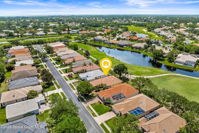 8051 Daventry Dr, Melbourne, FL 32940 - aerial view of residential area with a nearby body of water and a golf course