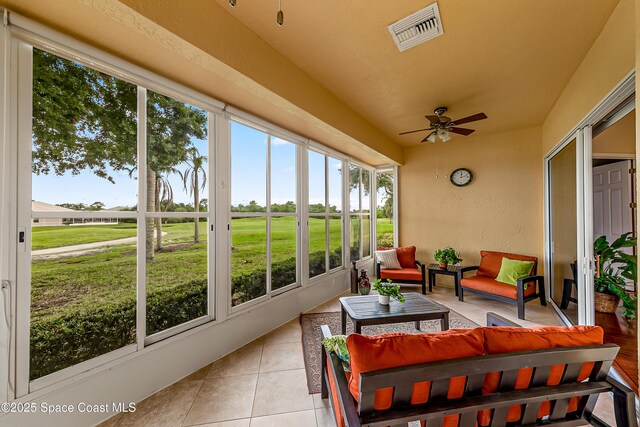 8051 Daventry Dr, Melbourne, FL 32940 - sunroom with ceiling fan and an outdoor living space