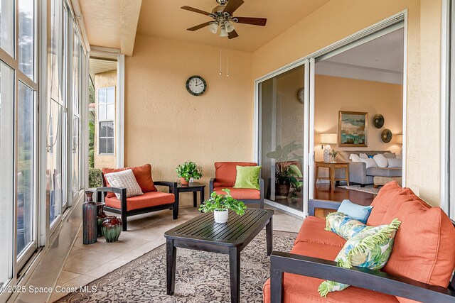 8051 Daventry Dr, Melbourne, FL 32940 - sunroom / solarium featuring ceiling fan and an outdoor living space