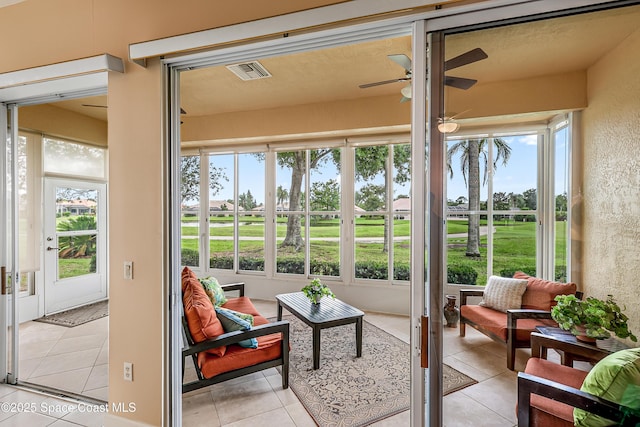8051 Daventry Dr, Melbourne, FL 32940 - sunroom / solarium featuring a ceiling fan and plenty of natural light