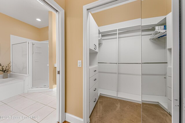 8051 Daventry Dr, Melbourne, FL 32940 - spacious closet with light tile patterned floors