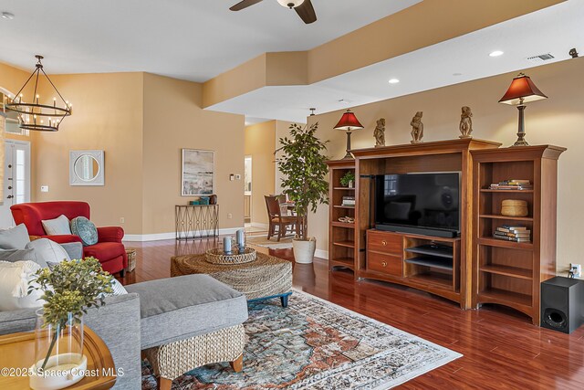 8051 Daventry Dr, Melbourne, FL 32940 - living room featuring wood finished floors, ceiling fan, a chandelier, baseboards, and recessed lighting