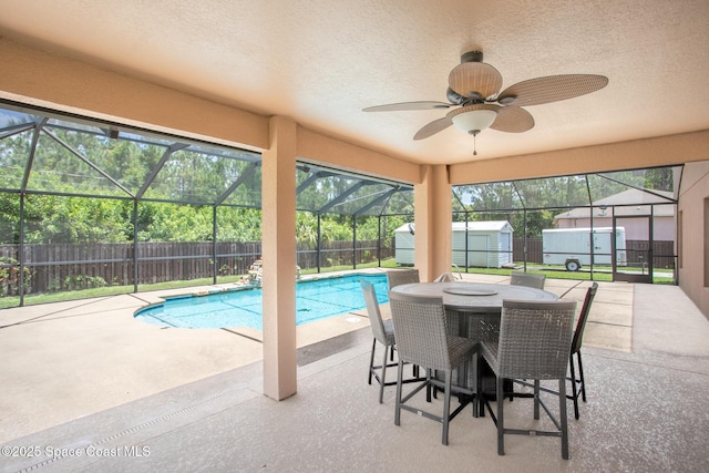 2501 Eldron Blvd SE, Palm Bay, FL 32909 - view of swimming pool with a patio, a fenced backyard, glass enclosure, and a ceiling fan