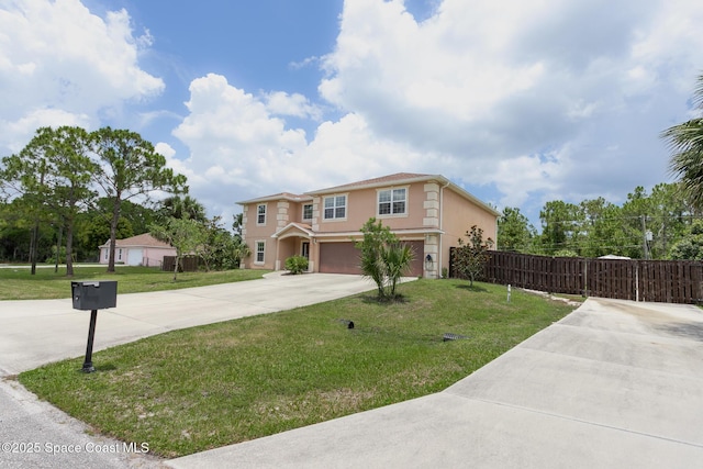 2501 Eldron Blvd SE, Palm Bay, FL 32909 - view of front of house with concrete driveway, a garage, and stucco siding