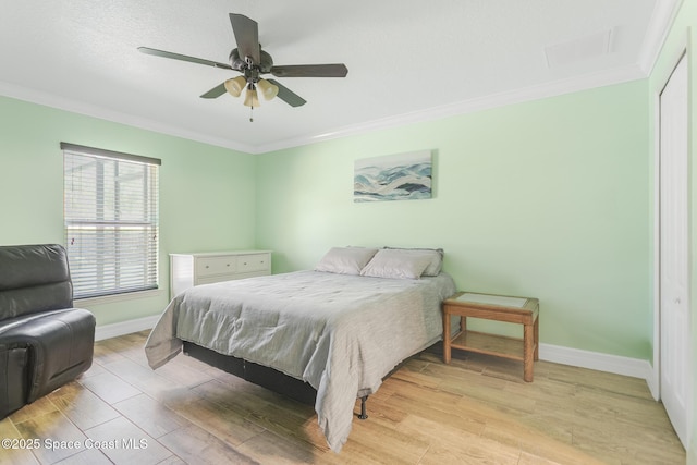 2501 Eldron Blvd SE, Palm Bay, FL 32909 - bedroom featuring crown molding, light wood-style floors, baseboards, and ceiling fan