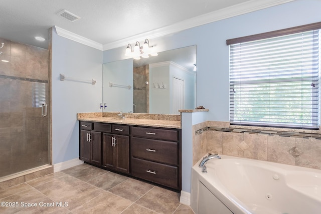 2501 Eldron Blvd SE, Palm Bay, FL 32909 - bathroom with a stall shower, vanity, a jetted tub, crown molding, and tile patterned flooring