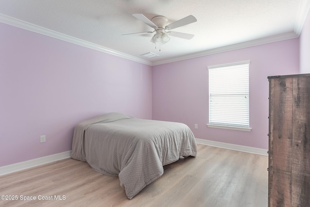 2501 Eldron Blvd SE, Palm Bay, FL 32909 - bedroom with light wood-type flooring, baseboards, ornamental molding, and a ceiling fan