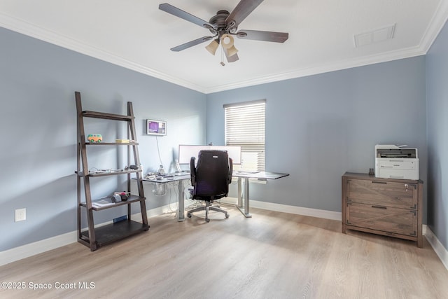 2501 Eldron Blvd SE, Palm Bay, FL 32909 - home office with wood finished floors, a ceiling fan, crown molding, and baseboards