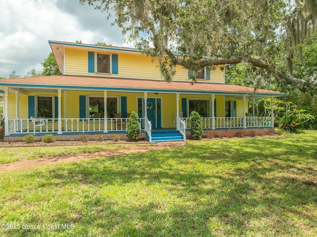 2280 Grove St, Titusville, FL 32796 - country-style home featuring covered porch and a front yard
