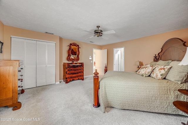 2280 Grove St, Titusville, FL 32796 - carpeted bedroom with a closet, a ceiling fan, and baseboards