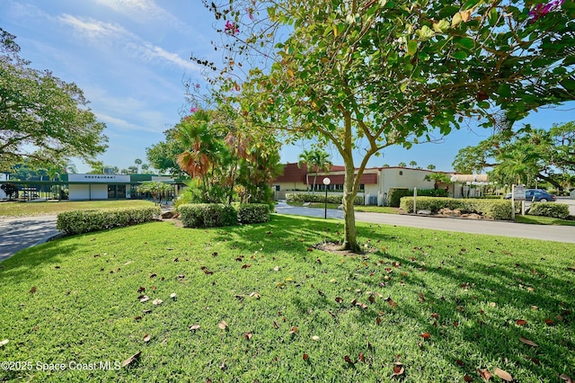 70 Royal Oak Ct Unit 206, Vero Beach, FL 32962 - ranch-style home with a front lawn