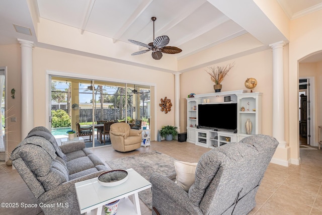 140 Miami Ave, Indialantic, FL 32903 - living area with ceiling fan, decorative columns, light tile patterned flooring, and beamed ceiling