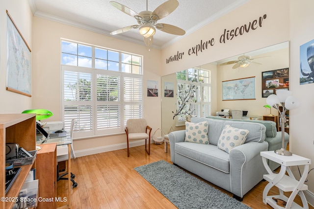 140 Miami Ave, Indialantic, FL 32903 - living area featuring ceiling fan, ornamental molding, a desk, hardwood / wood-style flooring, and a textured ceiling