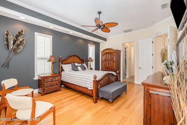140 Miami Ave, Indialantic, FL 32903 - bedroom featuring crown molding, light wood-style floors, recessed lighting, a ceiling fan, and baseboards