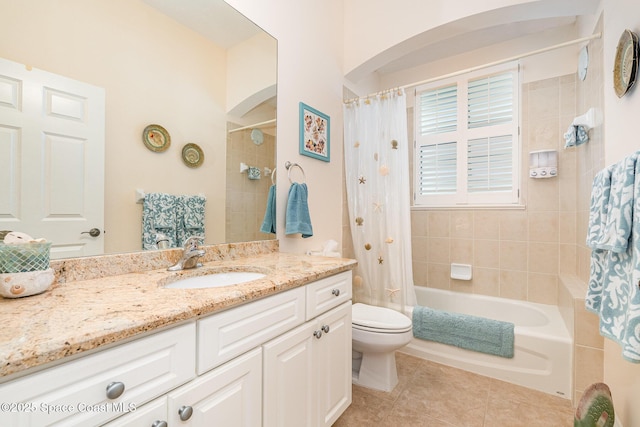 140 Miami Ave, Indialantic, FL 32903 - full bath featuring vanity, toilet, shower / bath combo, and tile patterned floors
