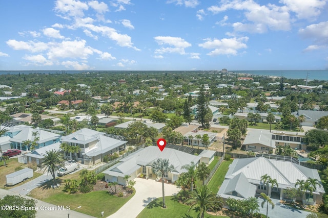 140 Miami Ave, Indialantic, FL 32903 - aerial perspective of suburban area with a nearby body of water