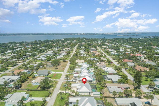 140 Miami Ave, Indialantic, FL 32903 - aerial view of property's location featuring nearby suburban area and a large body of water