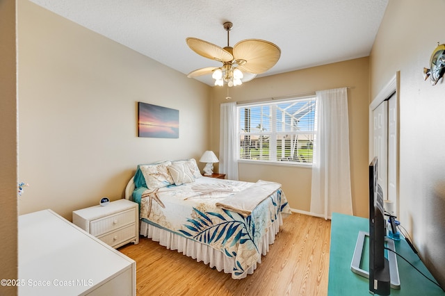 274 Clyde St, Melbourne Beach, FL 32951 - bedroom featuring light wood-style flooring, ceiling fan, and baseboards