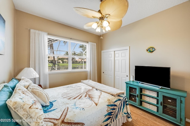 274 Clyde St, Melbourne Beach, FL 32951 - bedroom with wood finished floors, a closet, and a ceiling fan